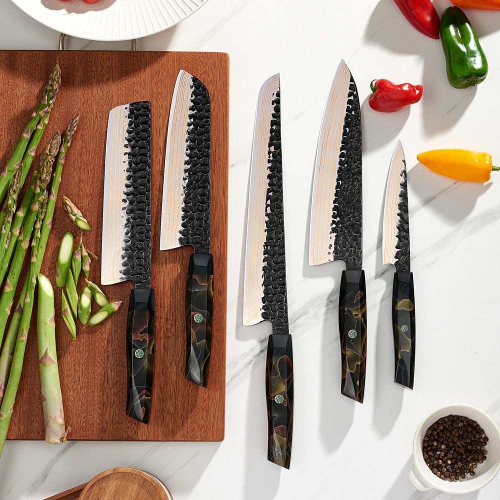 Collection of premium professional knives made of Damascus steel and copper, with resin and copper handles, displayed on a wooden board surrounded by vegetables.