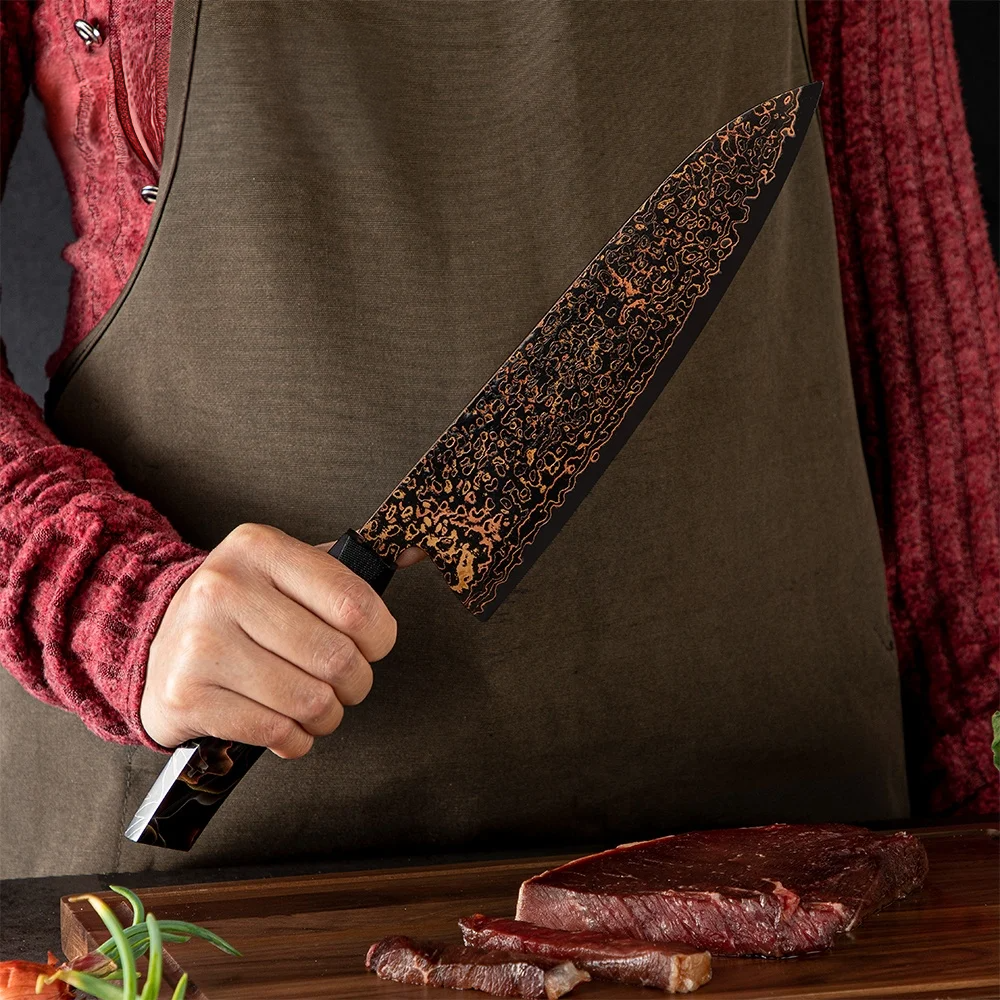 Japanese chef holds damascus knife with copper damascus very sharp and beautiful