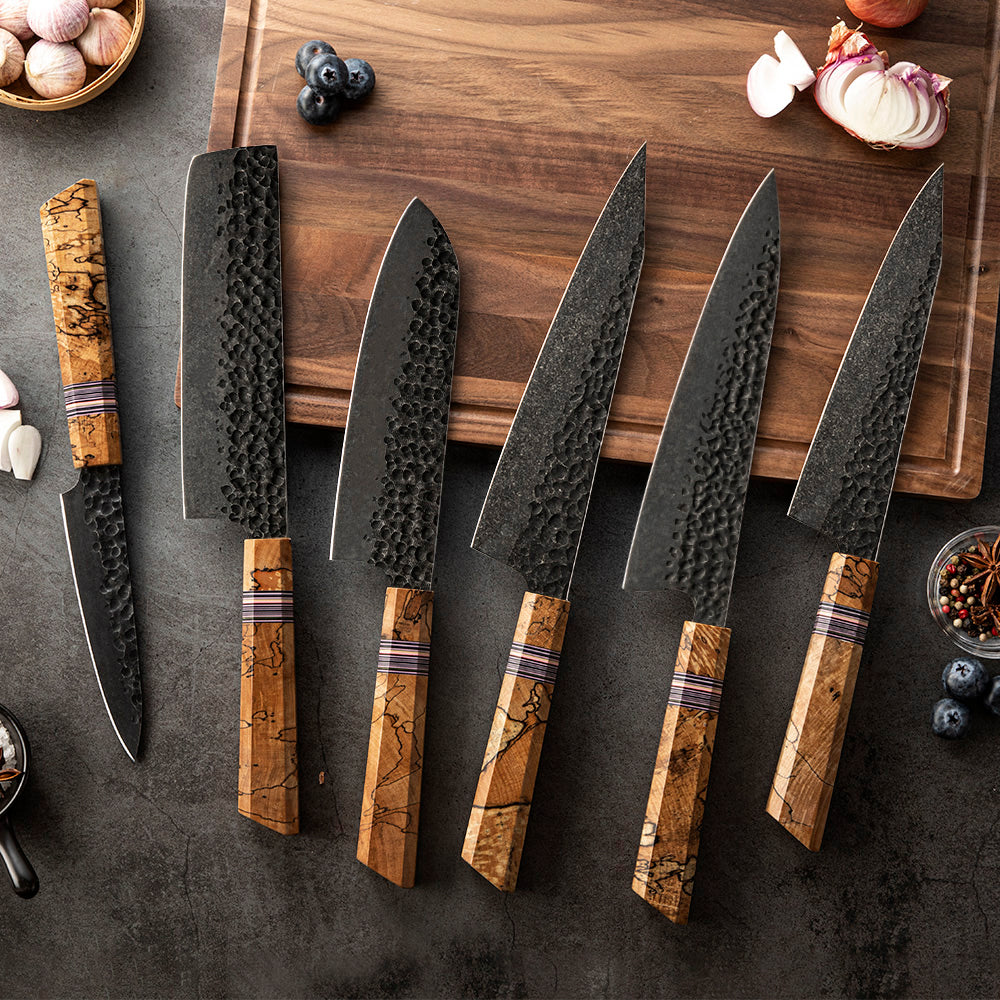 professional collection of japanese knives with carbon steel blades